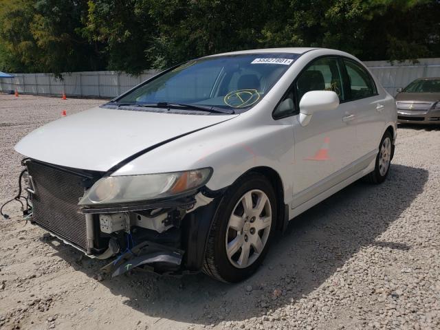 Photo 1 VIN: 2HGFA1F57AH568874 - HONDA CIVIC LX 