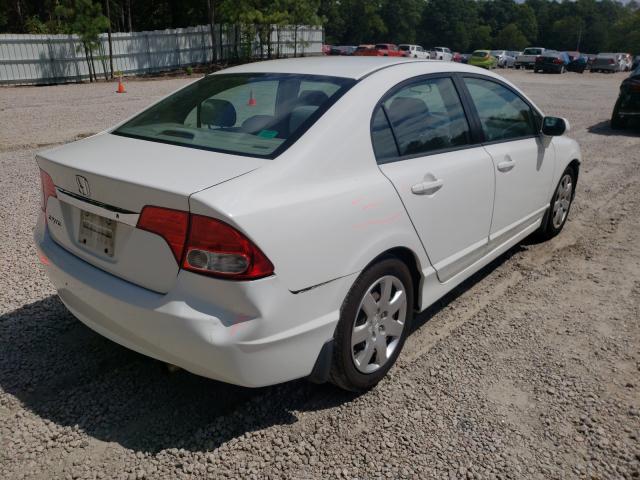 Photo 3 VIN: 2HGFA1F57AH568874 - HONDA CIVIC LX 