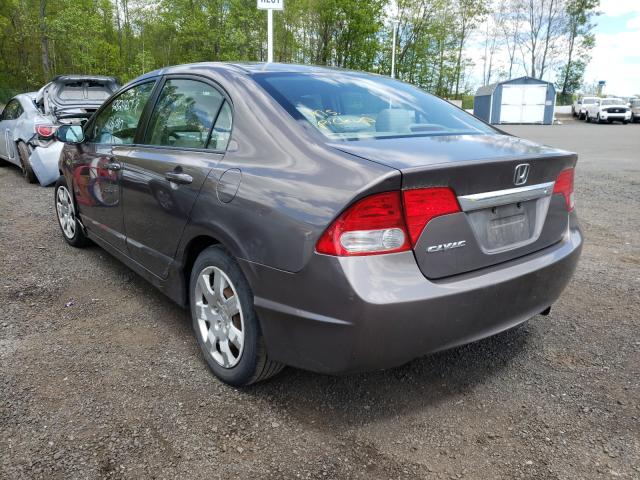 Photo 2 VIN: 2HGFA1F57AH576389 - HONDA CIVIC LX 