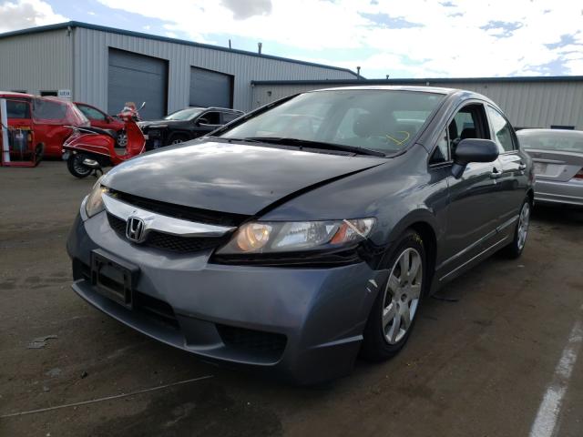 Photo 1 VIN: 2HGFA1F57AH588221 - HONDA CIVIC LX 