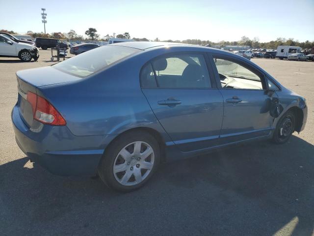 Photo 2 VIN: 2HGFA1F57BH529039 - HONDA CIVIC LX 