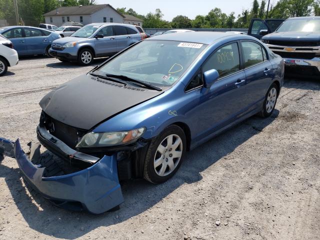 Photo 1 VIN: 2HGFA1F58AH323050 - HONDA CIVIC LX 