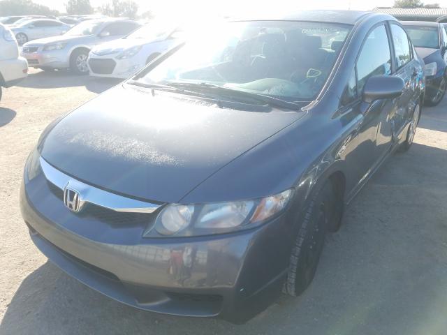 Photo 1 VIN: 2HGFA1F58AH329124 - HONDA CIVIC LX 