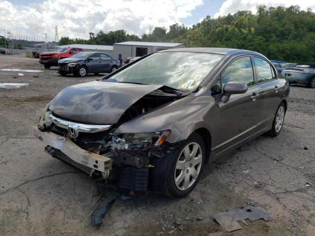 Photo 1 VIN: 2HGFA1F58AH547712 - HONDA CIVIC LX 