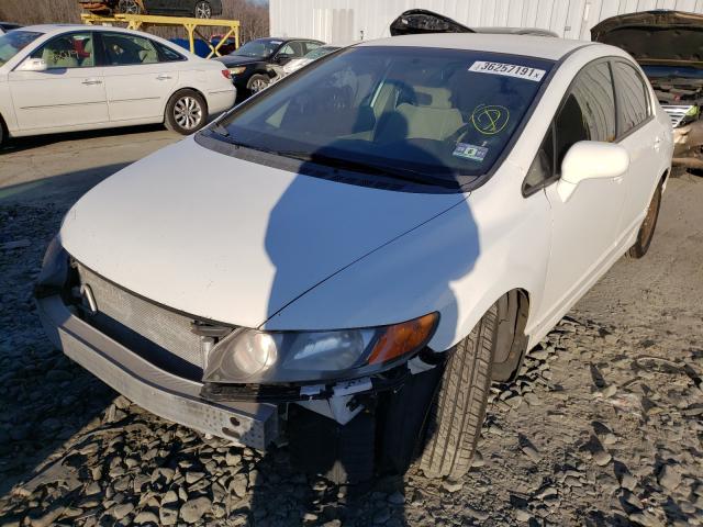 Photo 1 VIN: 2HGFA1F58AH551517 - HONDA CIVIC LX 