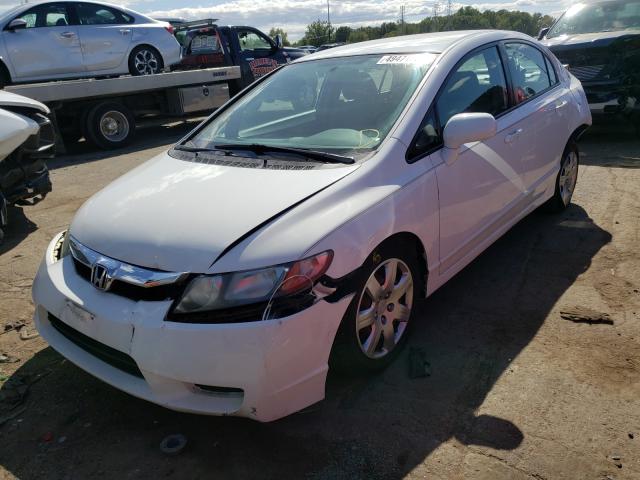 Photo 1 VIN: 2HGFA1F58AH569547 - HONDA CIVIC LX 