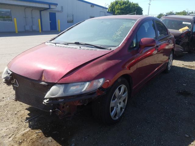 Photo 1 VIN: 2HGFA1F58AH570827 - HONDA CIVIC LX 