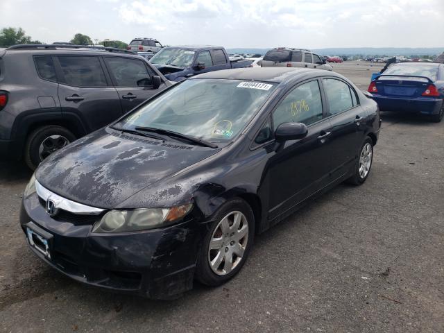 Photo 1 VIN: 2HGFA1F58AH572285 - HONDA CIVIC LX 