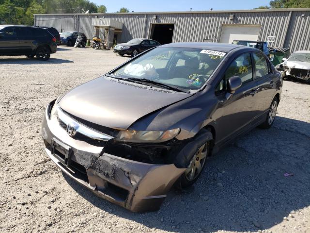 Photo 1 VIN: 2HGFA1F58AH580242 - HONDA CIVIC LX 