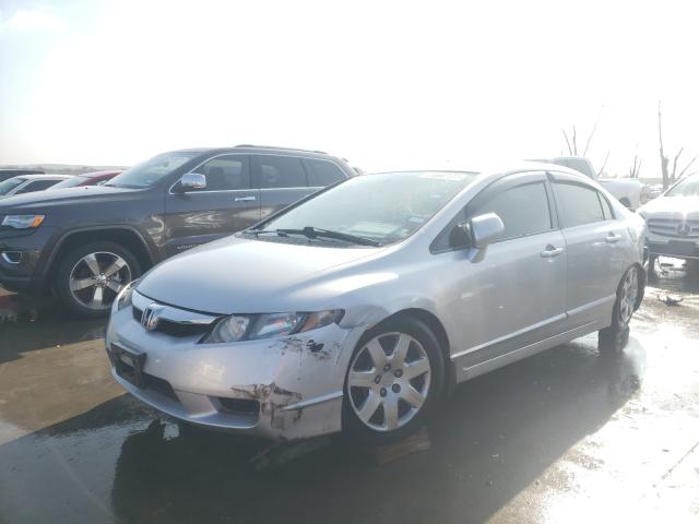 Photo 1 VIN: 2HGFA1F59AH320237 - HONDA CIVIC LX 