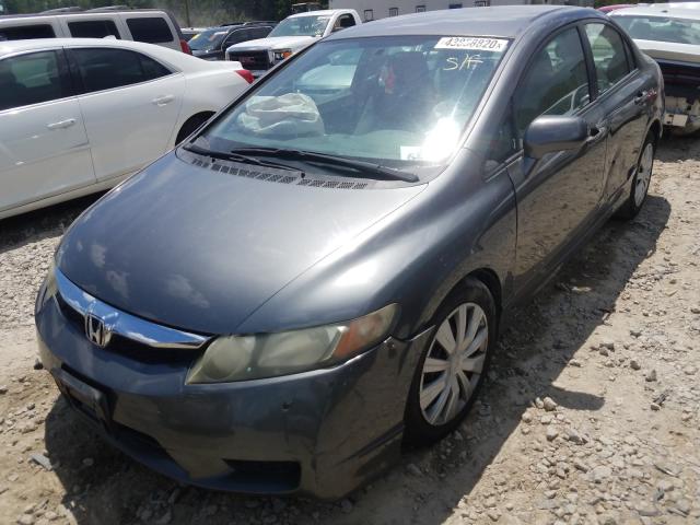 Photo 1 VIN: 2HGFA1F59AH330119 - HONDA CIVIC LX 