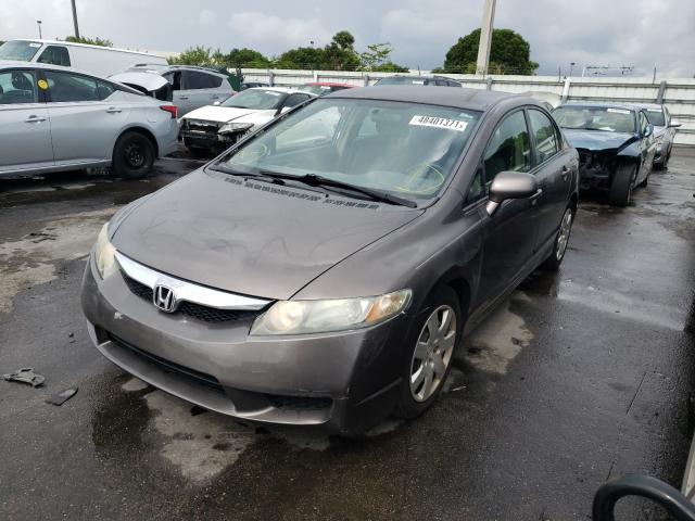 Photo 1 VIN: 2HGFA1F59AH505436 - HONDA CIVIC LX 