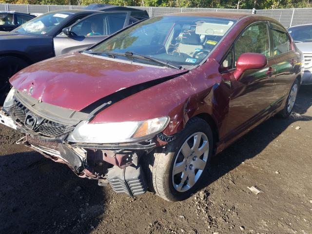 Photo 1 VIN: 2HGFA1F59AH542843 - HONDA CIVIC LX 