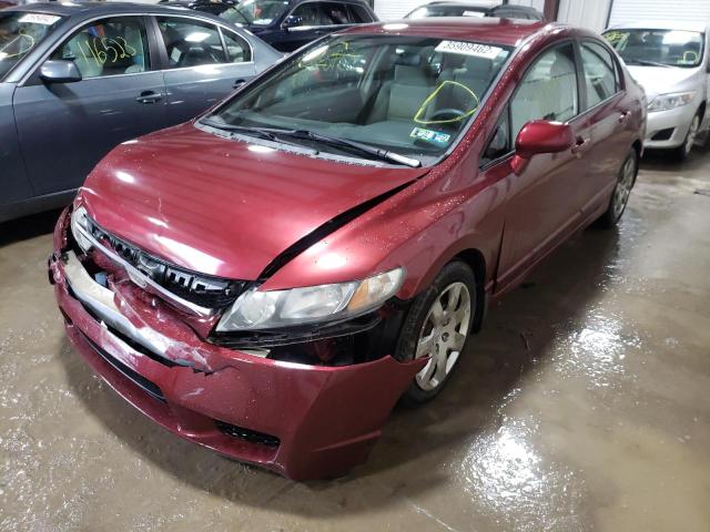 Photo 1 VIN: 2HGFA1F59AH544253 - HONDA CIVIC LX 