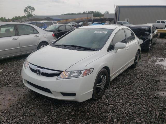 Photo 1 VIN: 2HGFA1F59AH577429 - HONDA CIVIC LX 