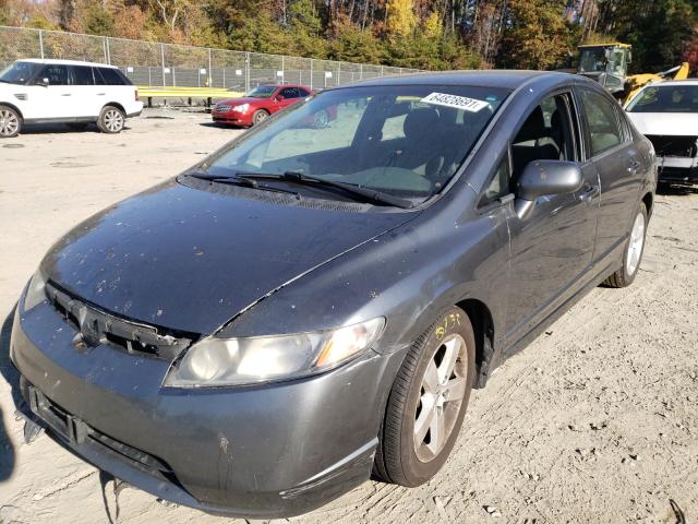 Photo 1 VIN: 2HGFA1F59AH586566 - HONDA CIVIC LX 