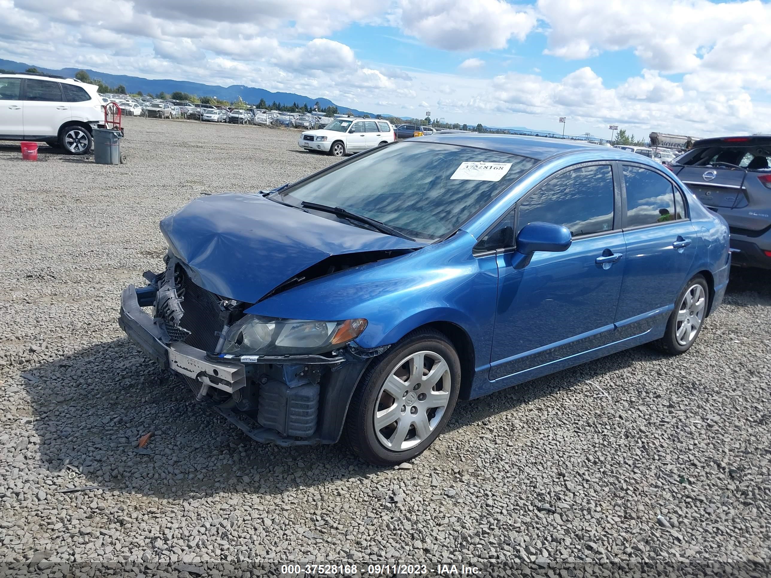 Photo 1 VIN: 2HGFA1F5XAH303933 - HONDA CIVIC 