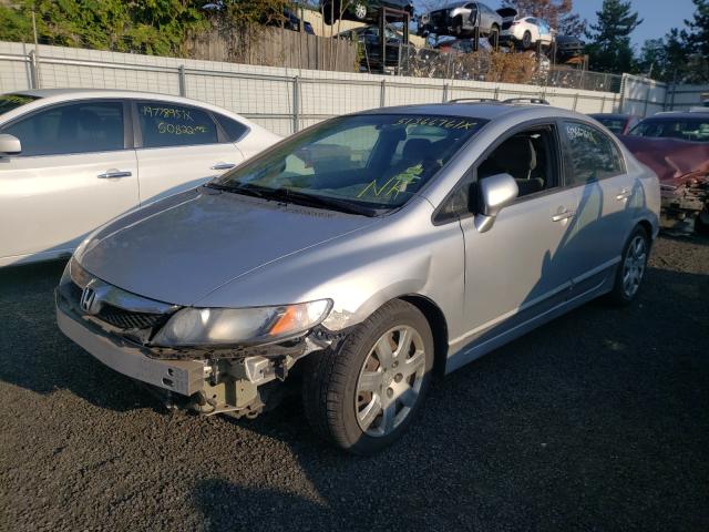 Photo 1 VIN: 2HGFA1F5XAH308856 - HONDA CIVIC LX 