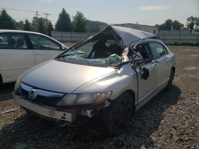 Photo 1 VIN: 2HGFA1F5XAH324068 - HONDA CIVIC LX 