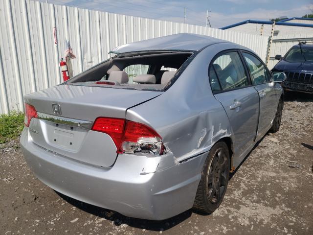 Photo 3 VIN: 2HGFA1F5XAH324068 - HONDA CIVIC LX 