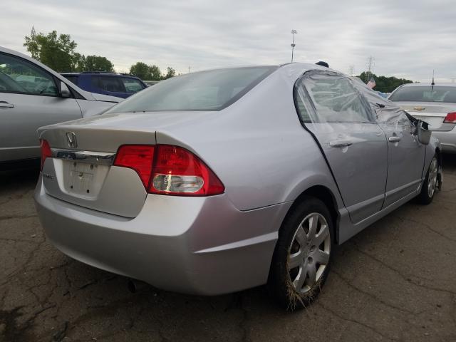 Photo 3 VIN: 2HGFA1F5XAH326368 - HONDA CIVIC LX 