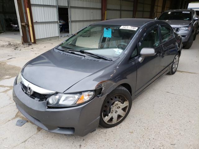 Photo 1 VIN: 2HGFA1F5XAH327133 - HONDA CIVIC LX 