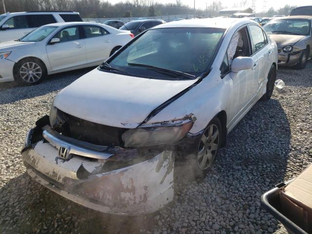 Photo 1 VIN: 2HGFA1F5XAH522892 - HONDA CIVIC LX 