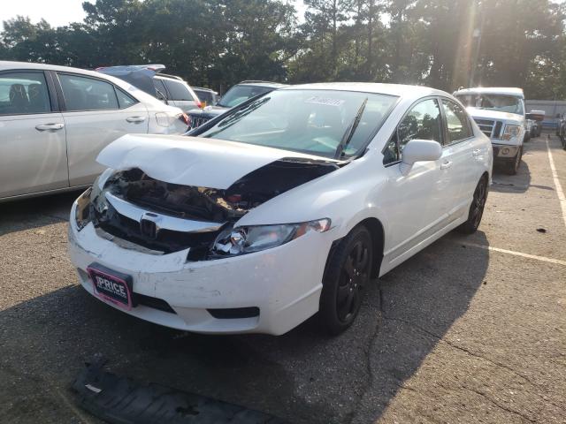 Photo 1 VIN: 2HGFA1F5XAH537005 - HONDA CIVIC LX 