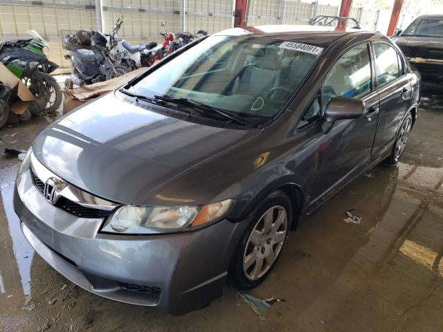 Photo 1 VIN: 2HGFA1F5XAH545931 - HONDA CIVIC LX 