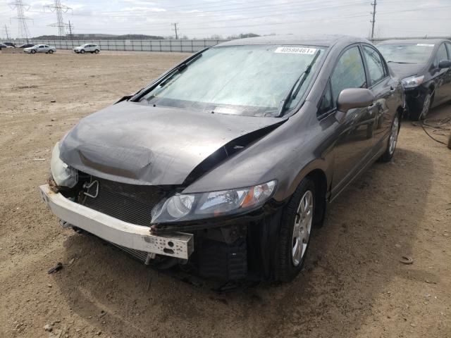 Photo 1 VIN: 2HGFA1F5XAH547100 - HONDA CIVIC LX 