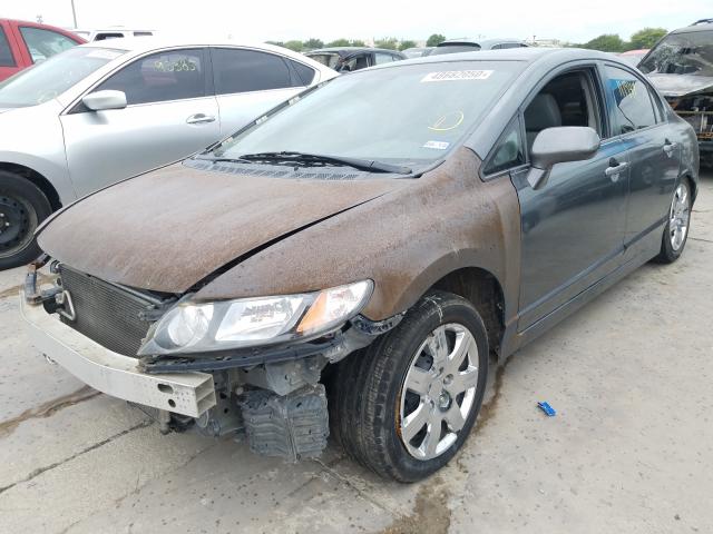 Photo 1 VIN: 2HGFA1F5XAH553365 - HONDA CIVIC LX 