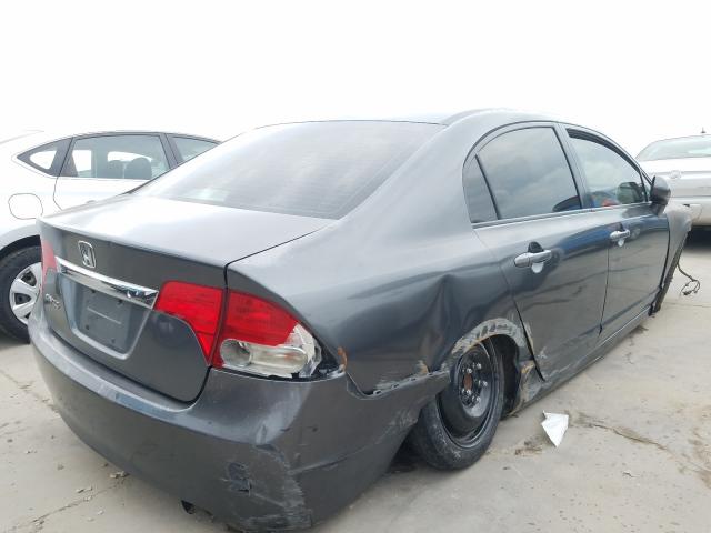 Photo 3 VIN: 2HGFA1F5XAH553365 - HONDA CIVIC LX 