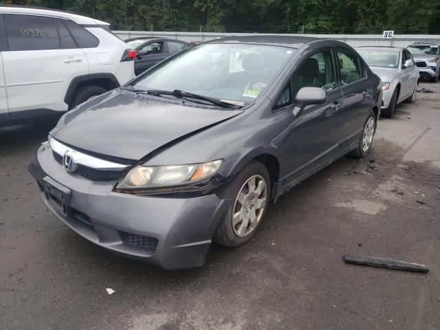 Photo 1 VIN: 2HGFA1F5XAH561921 - HONDA CIVIC LX 