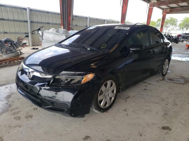 Photo 1 VIN: 2HGFA1F5XAH569713 - HONDA CIVIC LX 