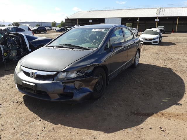 Photo 1 VIN: 2HGFA1F5XAH585460 - HONDA CIVIC LX 