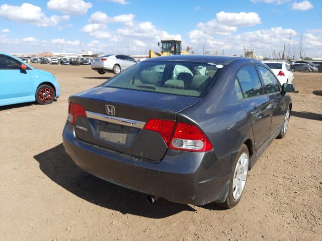 Photo 3 VIN: 2HGFA1F5XAH585460 - HONDA CIVIC LX 