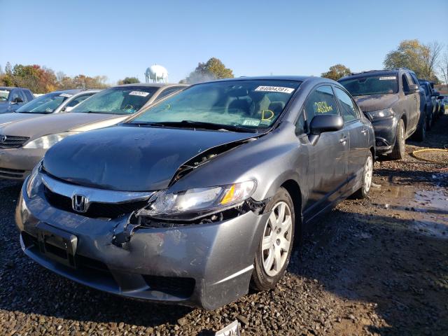 Photo 1 VIN: 2HGFA1F5XBH302041 - HONDA CIVIC LX 