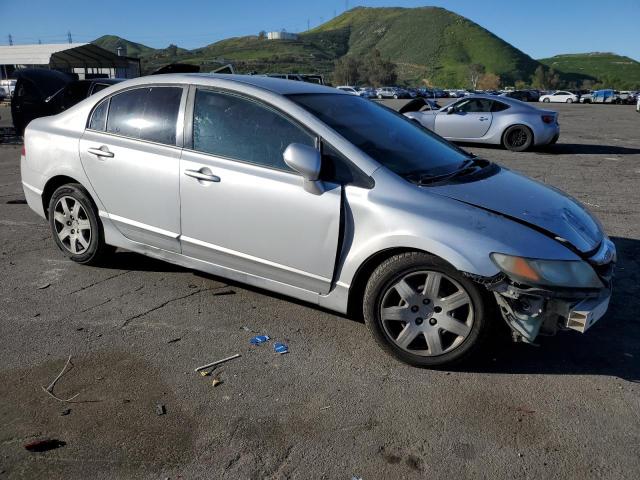 Photo 3 VIN: 2HGFA1F5XBH523283 - HONDA CIVIC LX 