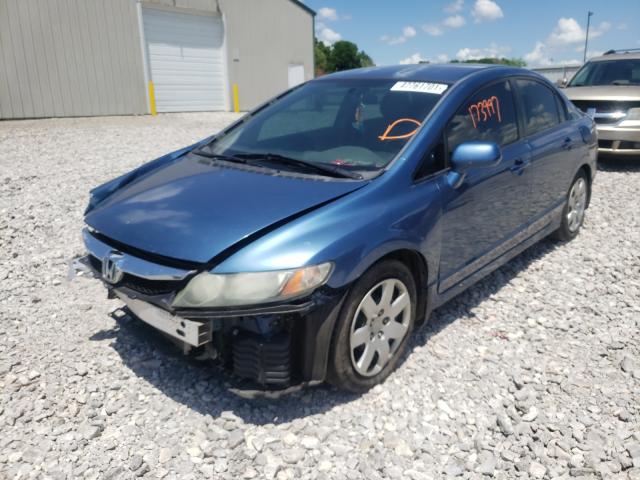 Photo 1 VIN: 2HGFA1F5XBH528600 - HONDA CIVIC LX 