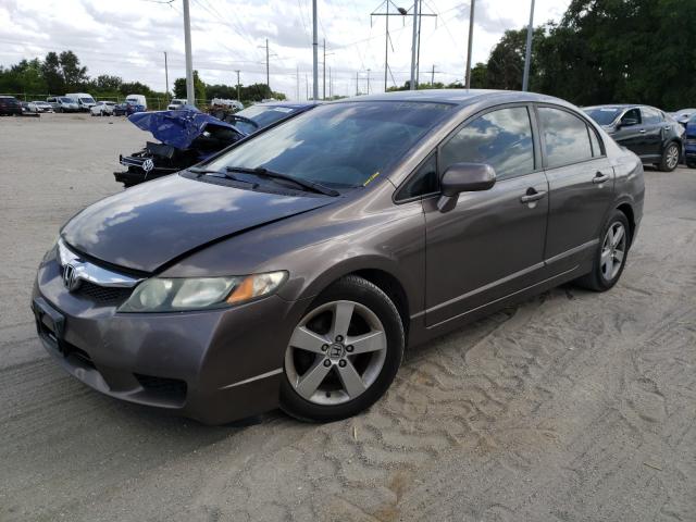 Photo 1 VIN: 2HGFA1F60AH558597 - HONDA CIVIC LX-S 