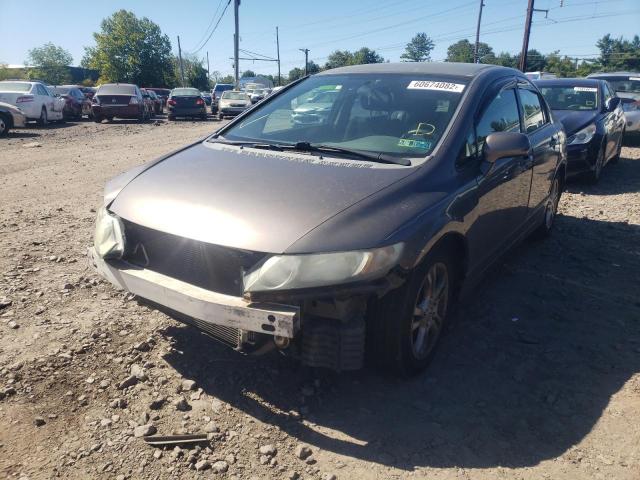 Photo 1 VIN: 2HGFA1F65AH506074 - HONDA CIVIC LX-S 