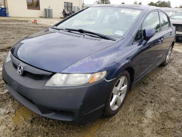 Photo 1 VIN: 2HGFA1F6XAH511609 - HONDA CIVIC LX-S 