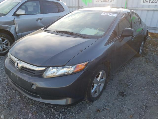 Photo 1 VIN: 2HGFB2E2XCH012877 - HONDA CIVIC DX 