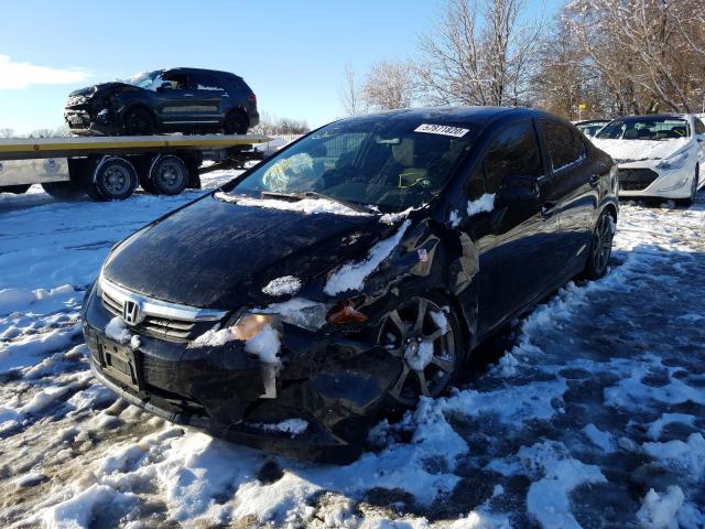 Photo 1 VIN: 2HGFB2E41CH009836 - HONDA CIVIC LX 