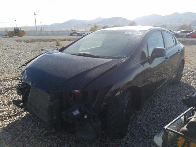 Photo 1 VIN: 2HGFB2E50CH524268 - HONDA CIVIC LX 