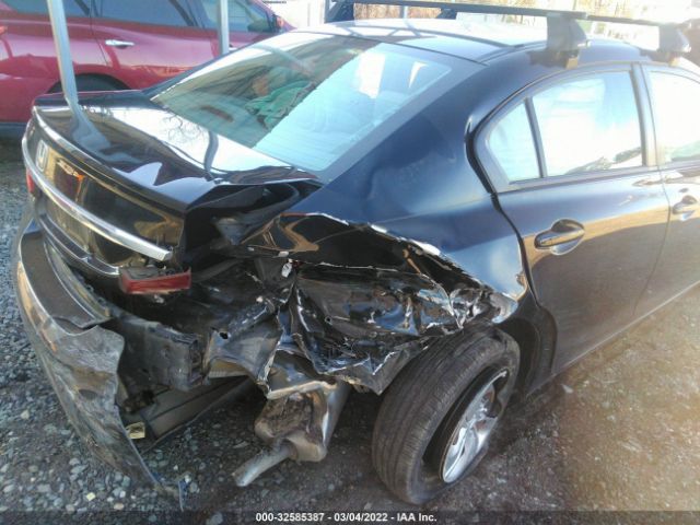 Photo 5 VIN: 2HGFB2E59EH557014 - HONDA CIVIC SEDAN 