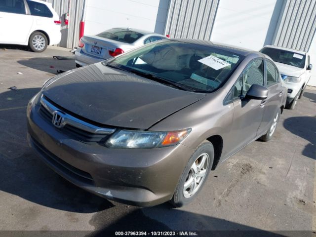 Photo 1 VIN: 2HGFB2E5XCH503105 - HONDA CIVIC SDN 