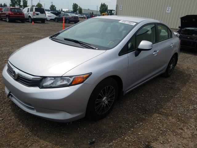 Photo 1 VIN: 2HGFB2F43CH052802 - HONDA CIVIC LX 