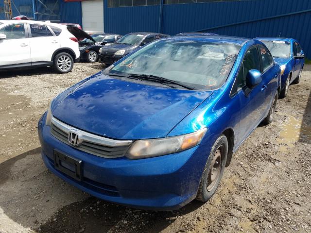 Photo 1 VIN: 2HGFB2F44CH005066 - HONDA CIVIC LX 