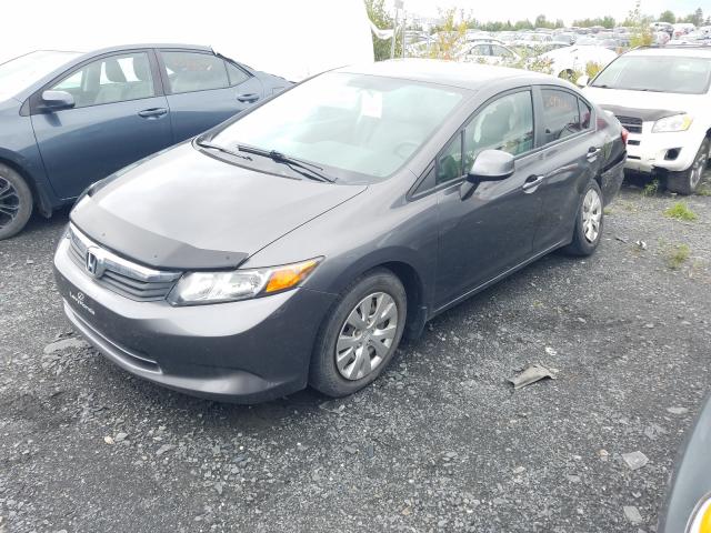 Photo 1 VIN: 2HGFB2F46CH040143 - HONDA CIVIC LX 